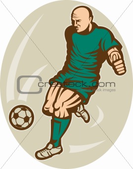 Soccer player running and kicking the ball