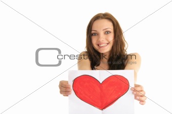 Young woman holding a painted heart
