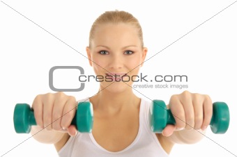 woman engaged in fitness dumbbells