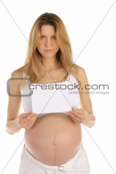 Dissatisfied pregnant woman with a blank form