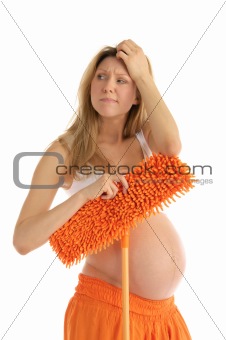 pensive pregnant woman with a mop