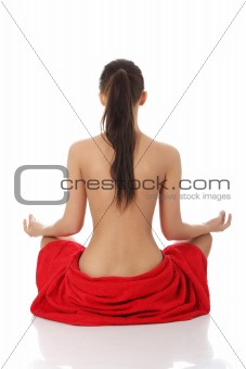 Young beautiful woman meditating