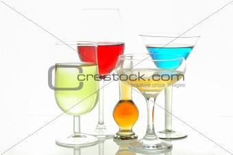 Different glasses with alcoholic drinks