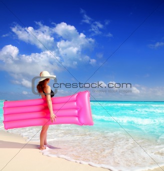  beach woman floating lounge pink tropical Caribbean
