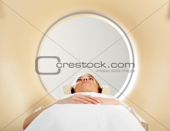 Woman taking CT Scan