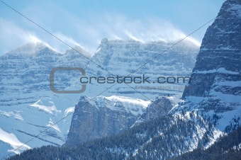 Snow spindrift on mountain peak 