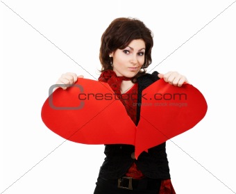 Woman tearing big red peper heart