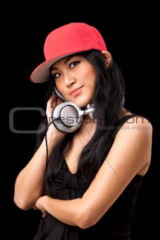 Female DJ listening to music