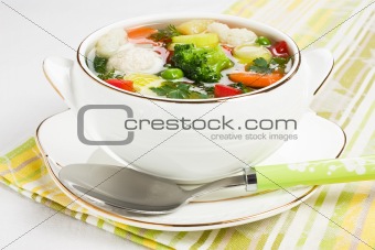 Soup with chicken meatballs and fresh vegetable