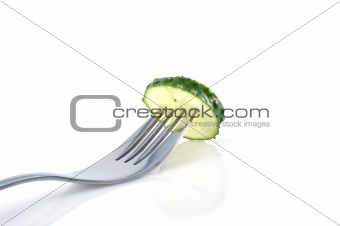 Piece of cucumber on the fork
