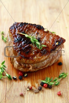 close-up of juicy sirloin beef covered in pepper