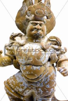 Ancient porcelain figure of a chinese god isolated on white with clipping path 