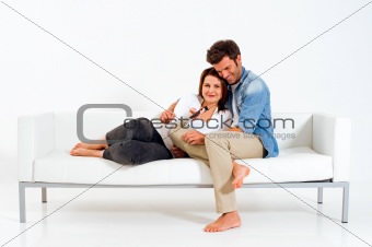 Couple on the couch watching TV