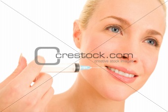 Woman with syringe of Botox
