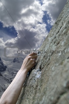 Climber's hand with quick-draws