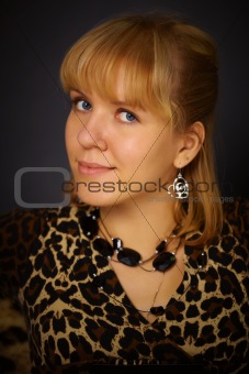 Portrait of beautiful woman in leopard dress
