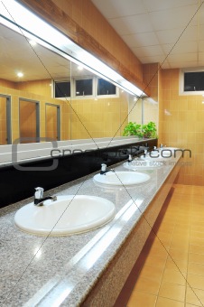 Handbasin and mirror in toilet