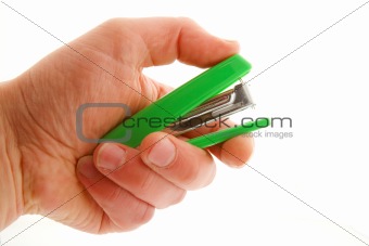 Man's hand with stapler