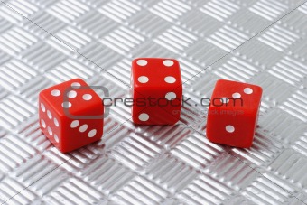 Three red dices