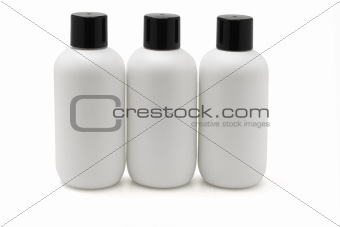Three white plastic bottles 