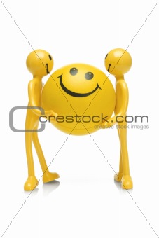 Smiley figurines holding smiley ball