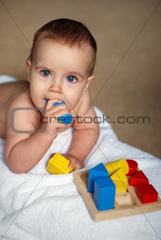 baby with bricks