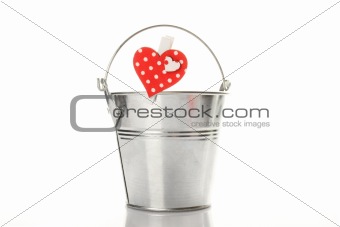 Metal bucket with a pin with a heart
