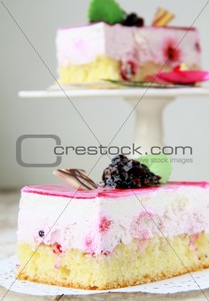 A piece of cake with black currant