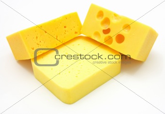 three pieces of different kinds of cheese