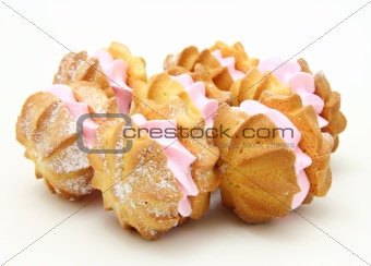 Yellow cookies with a  stuffing  on a white background 