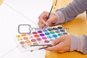Artist Choosing a Color