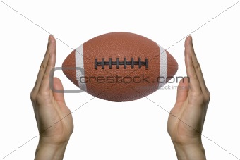 Football between two hands