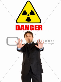 radiation danger! Portrait of scared young businessman
