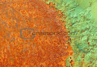 Partially rotted paint on metal surface