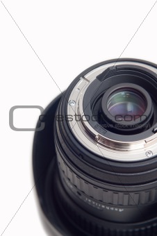 Cropped photographic lens on white background