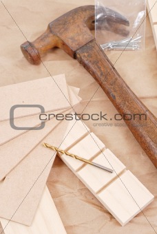 Drill Bit on Wood Pieces with Hammer