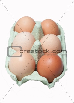 Six eggs in a box isolated on white