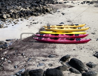 Five Kayaks On The Beach