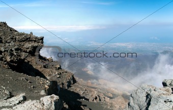 Panoramic view from mount Etna with sea and towns beneath, Sicil