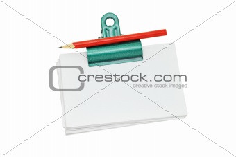 Bulldog clip holding loose memo papers