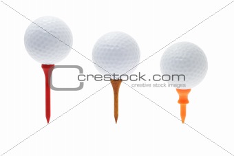 Golf balls on tees