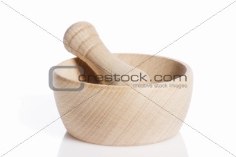 wooden pestle in a mortar