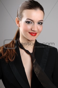 brunette in a denim suit
