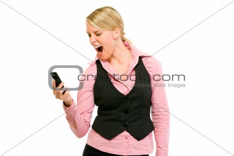 Angry modern business woman shouting on mobile phone
