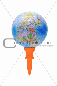 Globe on orange golf tee