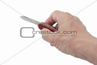 Hand holding red penknife