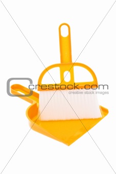 Plastic dust pan and brush in yellow