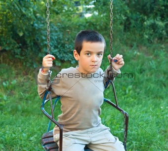 Boy swinging