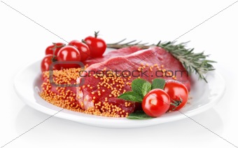 raw meat with spice on plate