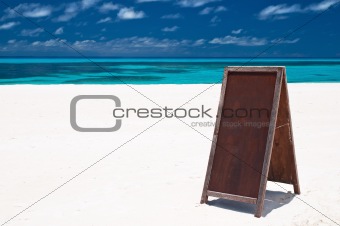 blank menu board at the beach